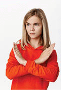Teen blond girl showing a cross gesture